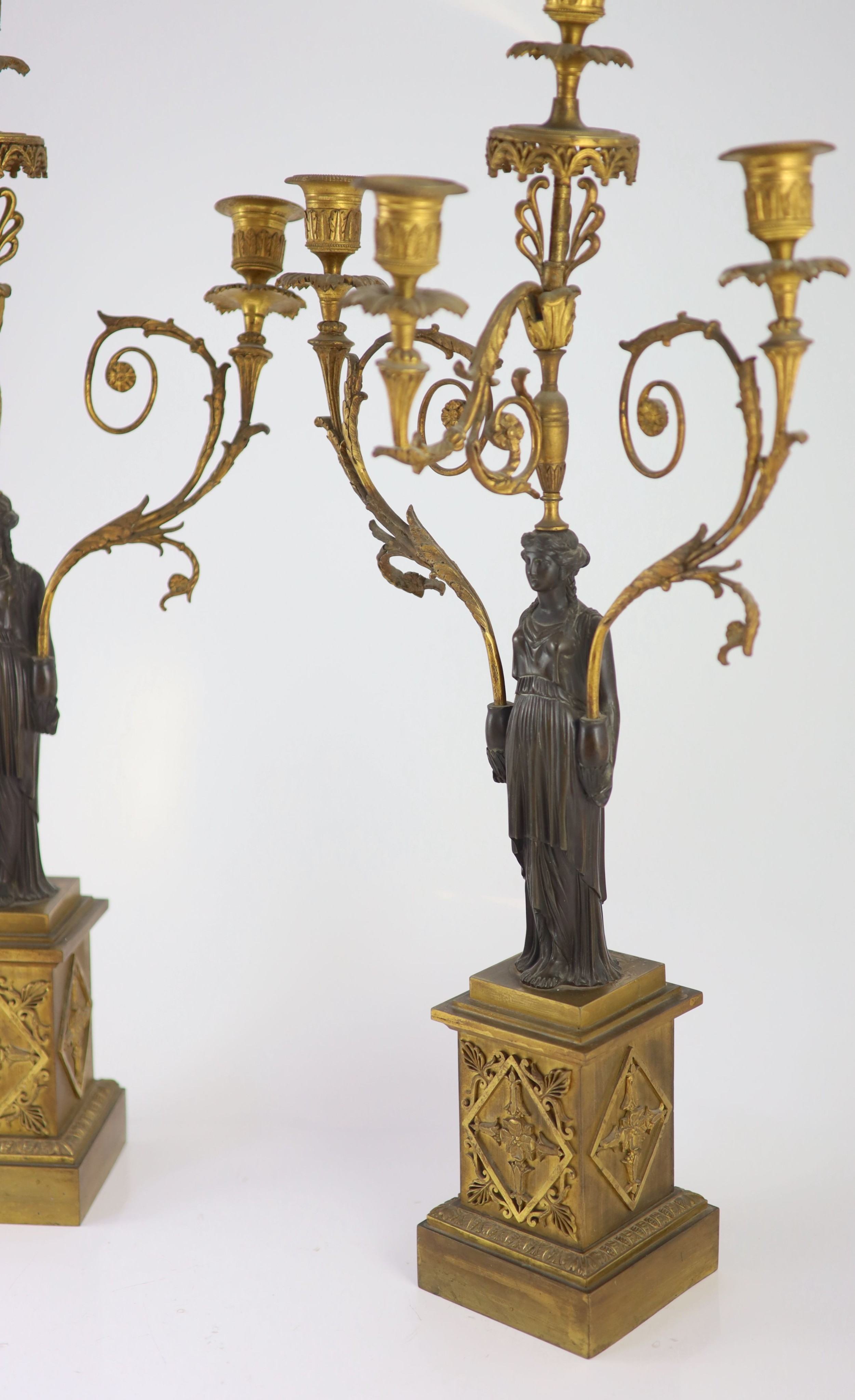 A pair of 19th-century French bronze and ormolu candelabra H 68cm. W 32cm.